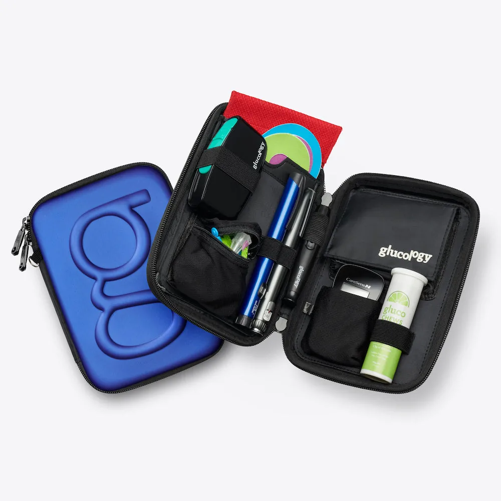 Open blue Glucology diabetes travel case shown by the manufacturer